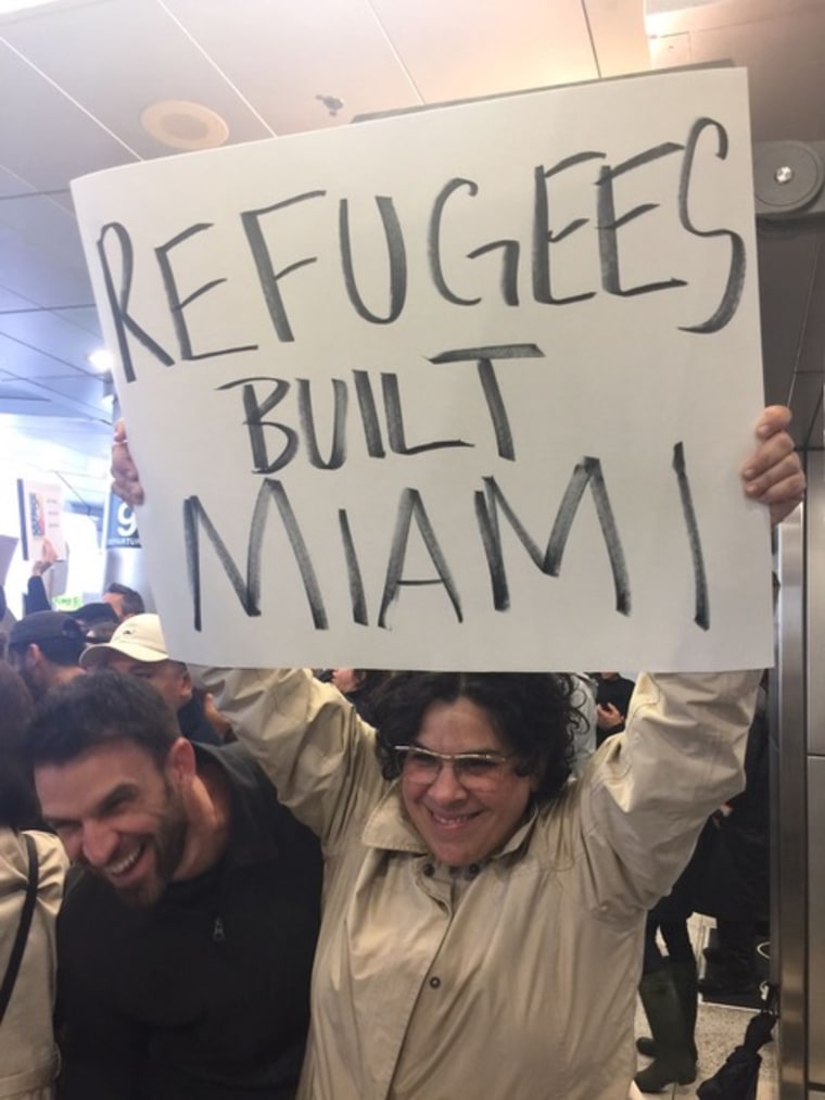 Opinion writer Carmen Pelaez at a rally at the Miami International Airport on Jan. 29 protesting Pres. Trump's immigration executive order.       