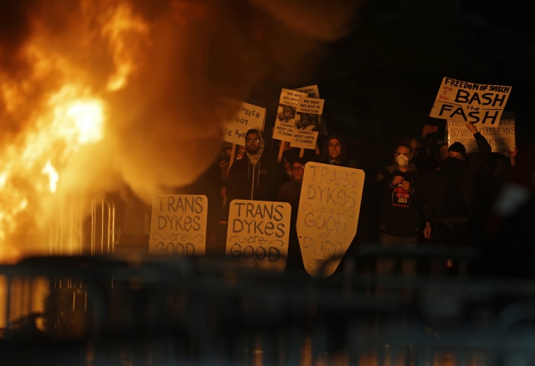 Image: Protesters watch a bonfire on Sproul Plaza during a rally against the scheduled speaking appearance by Breitbart News editor Milo Yiannopoulos on the University of California at Berkeley campus on Feb. 1, 2017, in Berkeley, Calif.