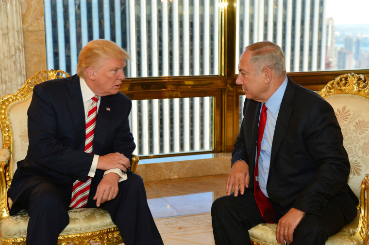 Image: Israeli Prime Minister Benjamin Netanyahu speaks to President Donald Trump during their meeting in New York on Sept. 25, 2016.