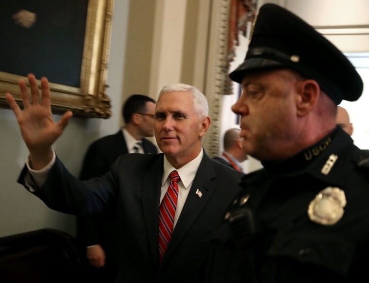 Image: U.S. Vice President Mike Pence waves as he leaves the Senate GOP policy luncheon on Capitol Hill, Jan. 31, 2017 in Washington, DC.