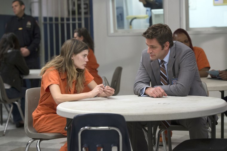 LAW &amp; ORDER: SPECIAL VICTIMS UNIT -- "Spring Awakening" Episode 1524 -- Pictured: (l-r) Emma Greenwell as Ellie Porter, Peter Hermann as Counselor Desappio