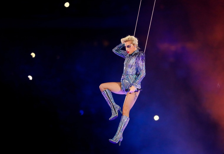 Image: Lady Gaga drops from the roof of the NRG Stadium in Houston.