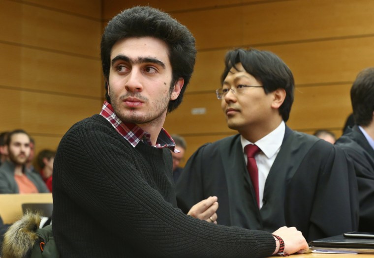 Image: Syrian refugee Anas Modamani and his lawyer Chan-jo Jun 