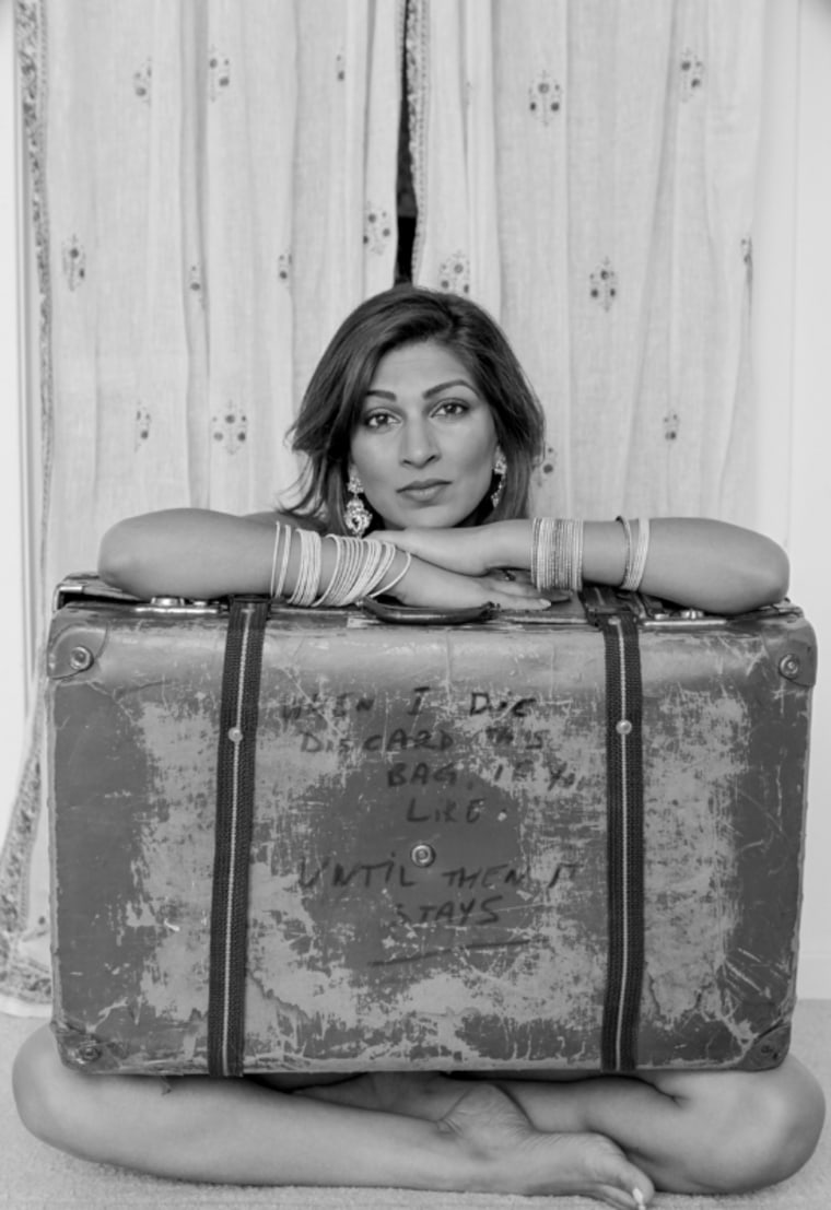 Playwright Minita Gandhi carries her father's old suitcase from the '70s.