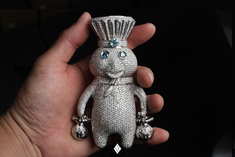 A four-inch Pillsbury Doughboy pendant smothered in diamonds from IF &amp; Co
