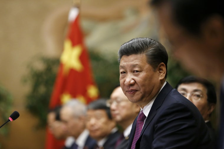 Image: Chinese President Xi Jinping attends a meeting at the United Nations European headquarters in Geneva