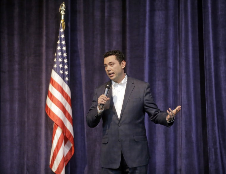 Image:Rep. Jason Chaffetz faces a hostile crowd.