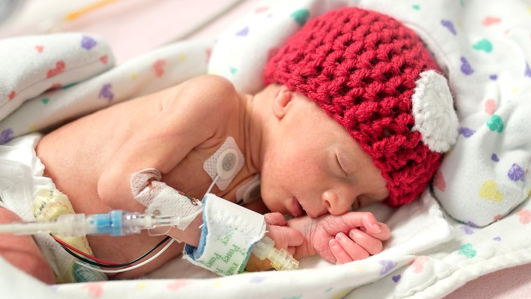 Parents felt pleasantly surprised to see their premature babies dressed as Valentine's Day gifts in the NICU at St. Luke's Hospital in Kansas City thanks to staff and the March of Dimes. 