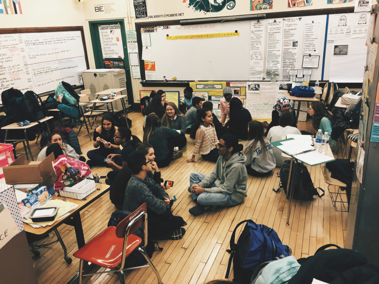 Students at Allderdice High School in Pittsburgh participate in a group discussion as part of their after-school club, Global Minds. The club pairs native English speakers with ESL students, allowing them to learn about new cultures and promote diversity.