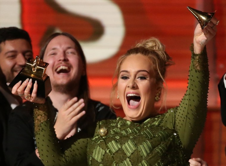 Image: Adele breaks the Grammy for Record of the Year for "Hello"