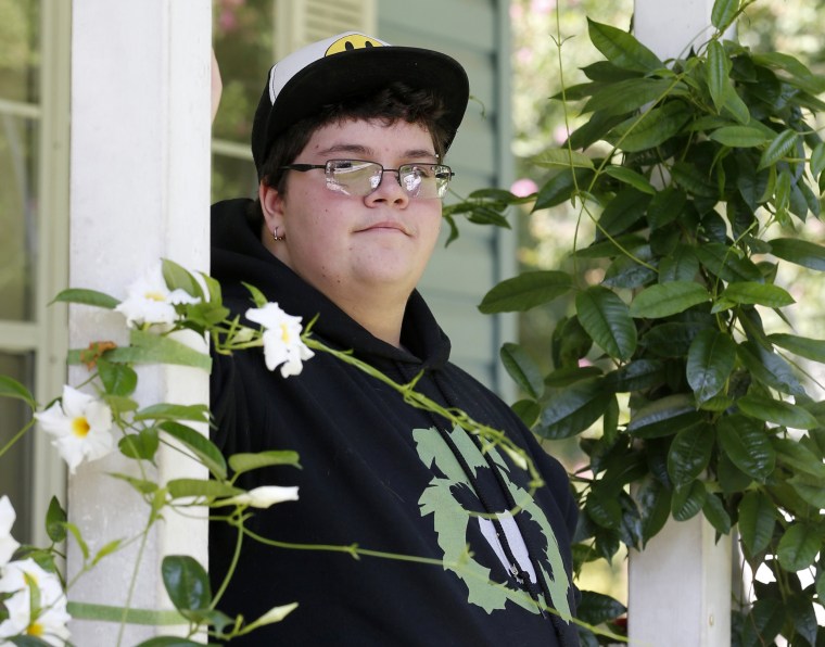 Image: Gavin Grimm stands on his front porch during an interview at his home in Gloucester, Virginia.