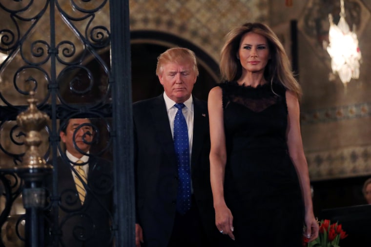 Image: U.S. President Donald Trump, First Lady Melania Trump and Japanese Prime Minister Shinzo Abe (L) walk to pose for a photograph before attending dinner at Mar-a-Lago Club in Palm Beach, Florida, U.S.