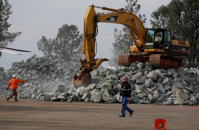 Image: Rock is prepped to be used on the Lake Oroville Dam after an evacuation was ordered for communities downstream from the dam, in Oroville, California