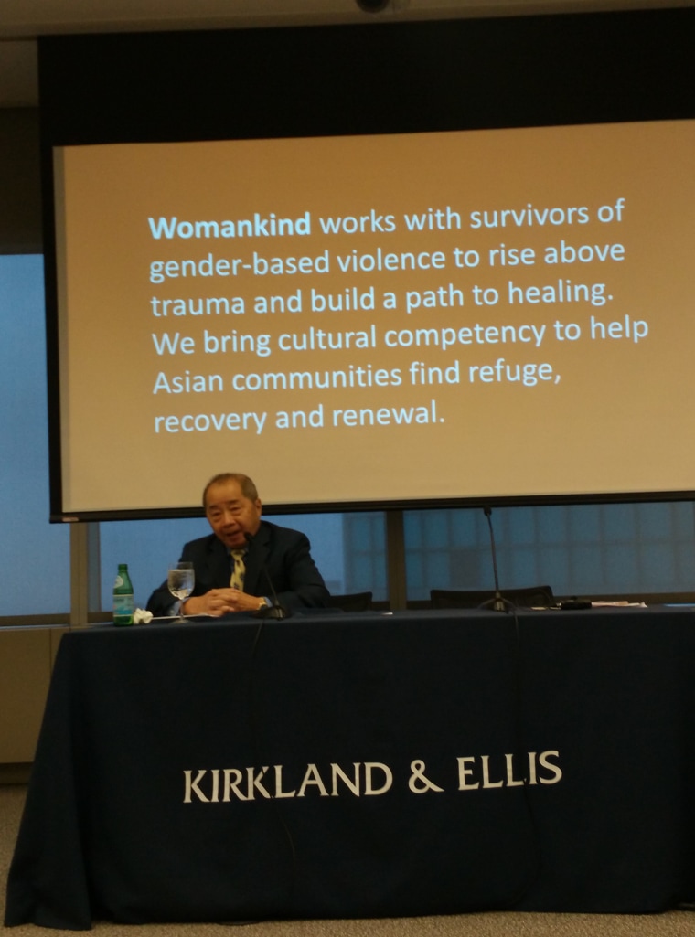 Womankind executive director Larry Lee at a press conference announcing the organization's re-branding.