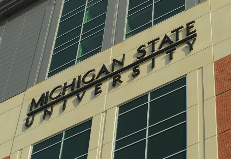 Image: A sign for Michigan State University is pictured on campus in East Lansing, Mich.
