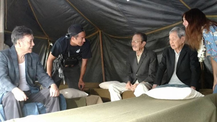 On the set of "Go For Broke" with actors Ban Daisuke (L) (portraying Matsujiro Otani) with Bishop Yoshiaki "Sharkey" Fujitani (age 93) and Ted Tsukiyama (age 96), real veterans portraying Japanese-American prisoners in the film.
