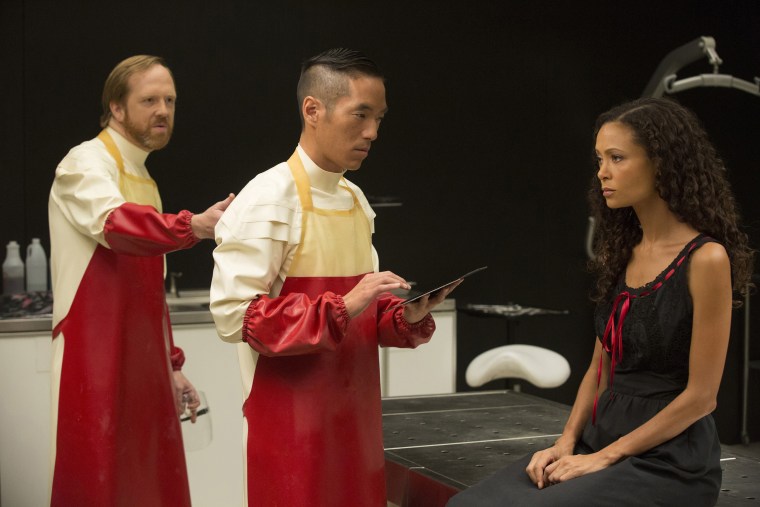 Image: Leonardo Nam (C) is pictured with fellow actors Ptolemy Slocum and Thandie Newton during an episode of HBO's "Westworld."