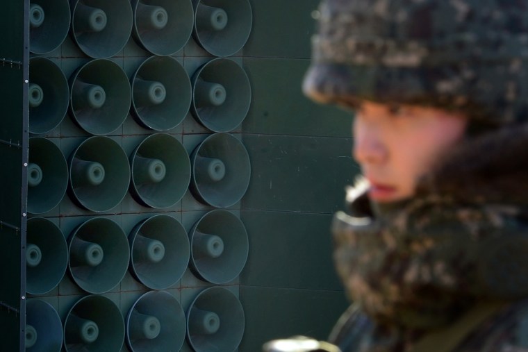 Image: A South Korean soldier stands next to the loudspeakers near the border area between South Korea and North Korea