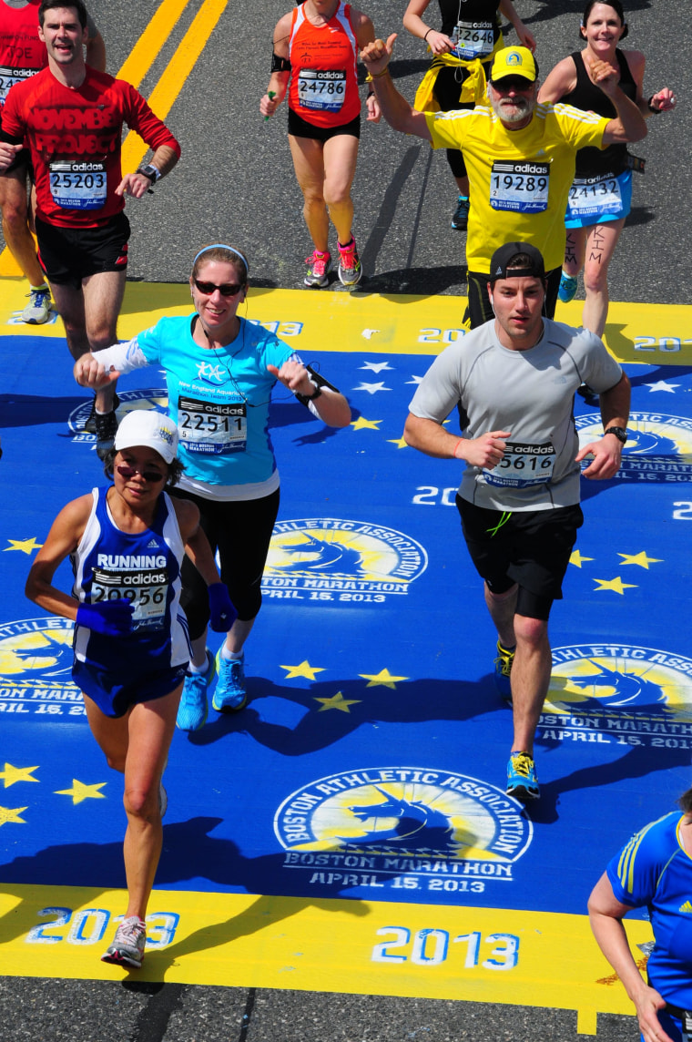 Chau Smith running at the start of the Boston Marathon in 2013