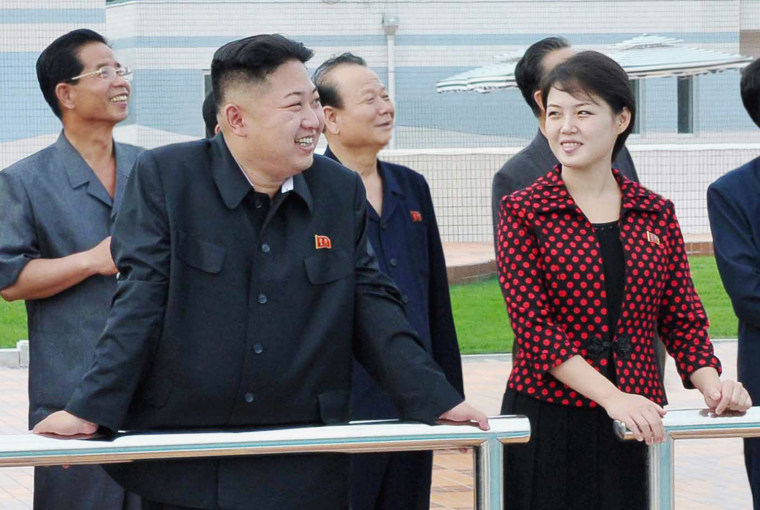 Image: North Korean leader Kim Jong-Un and his wife, who was named by the state broadcaster as Ri Sol-ju, visit the Rungna People's Pleasure Ground, in Pyongyang