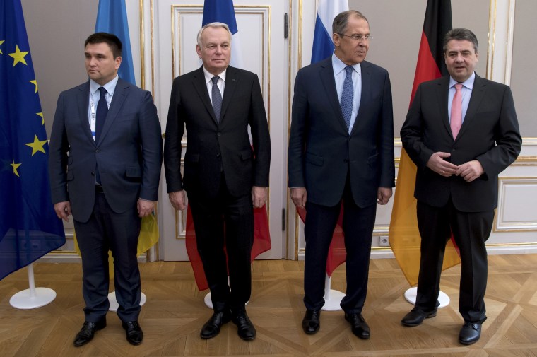 Image: Foreign Ministers of Ukraine Pavlo Klimkin, France Jean-Marc Ayrault, Russia Sergey Lavrov and Germany Sigmar Gabriel pose for a photograph during the 53rd Munich Security Conference in Munich