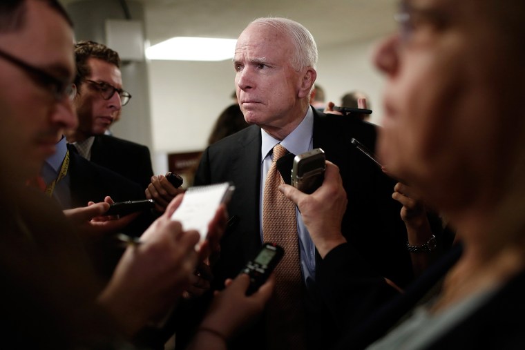 Image: McCain speaks with reporters about the resignation of National Security Advisor Michael Flynn