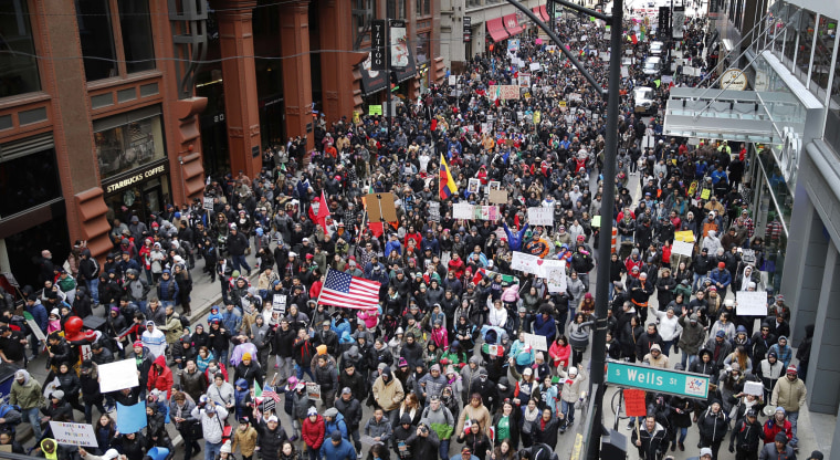 Image: Protesters participate in a march against efforts to crack down on immigration