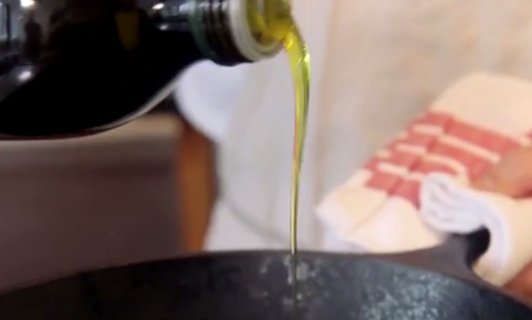 Pour olive oil into pan