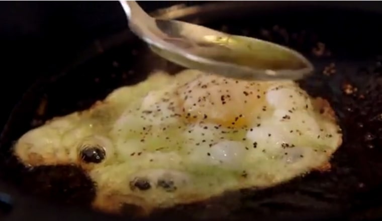 Spoon oil over egg for 30 seconds