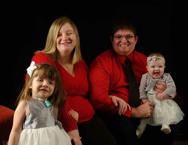 The Austin family: Eric, Krista, Madison, 3, and Mckenzie, 9 months.