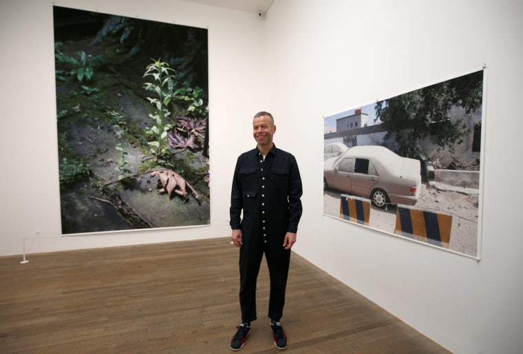 Image: Artist Wolfgang Tillmans poses for photographs among his latest exhibition at Tate Britain, in London