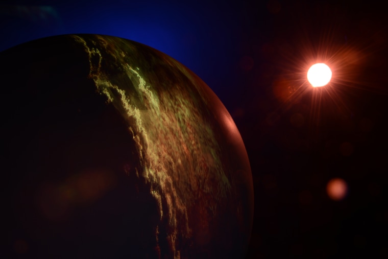 Artist's impression of a planet orbiting a red dwarf star.