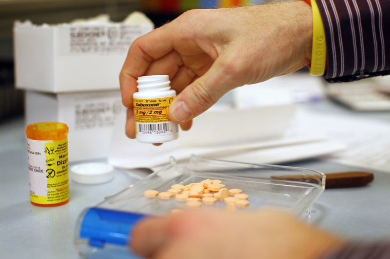 Image: A pharmacist fills a Suboxone prescription in Boston