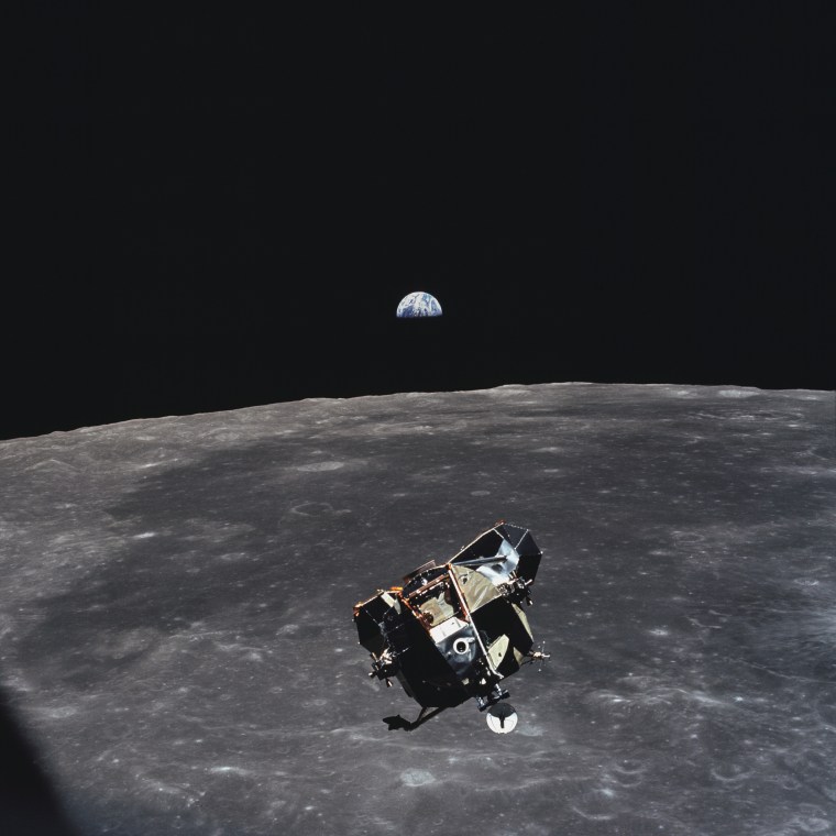 Image: The Apollo 11 Lunar Module ascent stage, with astronauts Neil A. Armstrong and Edwin E. Aldrin Jr. aboard, is photographed from the Command and Service Modules