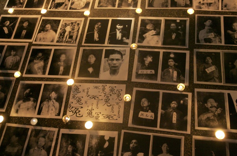 Image: Pictures of victims of "white terror" are displayed during a protest against Taiwan President Ma Ying-jeou in front of the Presidential Office in Taipei, Aug. 9, 2008.