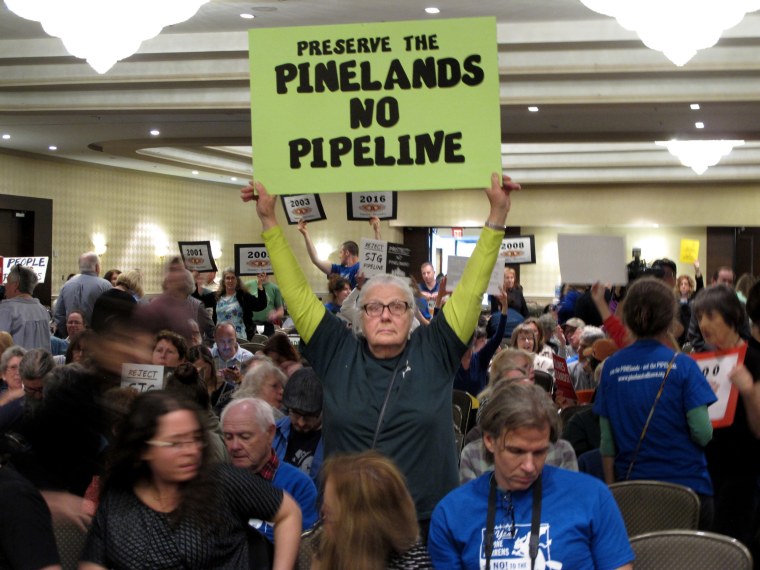 Image: Opponents of a proposed natural gas line that would run through New Jersey's federally protected Pinelands reserve gather inside a hotel in Cherry Hill New Jersey, Feb. 24, 2017.