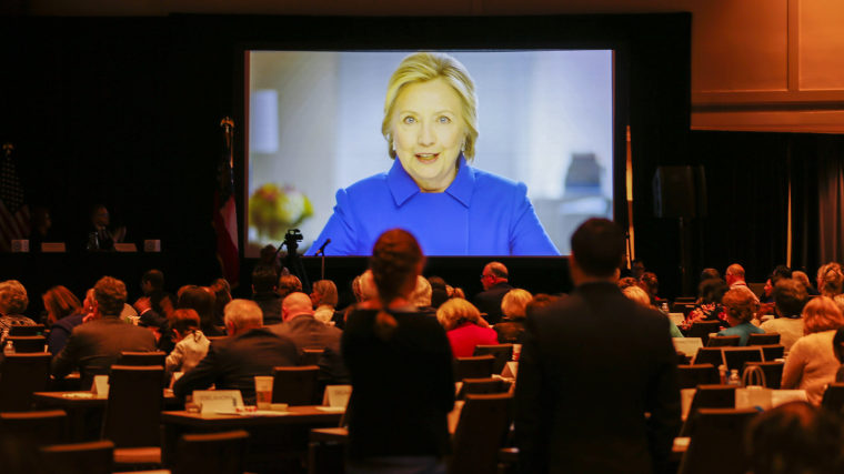 Image: Clinton delivers a videotaped address during the Democratic National Committee