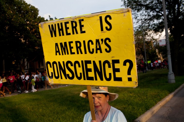 Image: Activists rally in Chicago's South Side for Trayvon Martin in addition to ending gun violence in their own city July 15, 2013 in Chicago, Illinois.