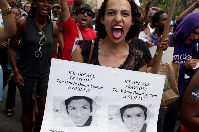 Image: The day after George Zimmerman was found not guilty of all charges in Florida in the Trayvon Martin case, large crowds gather at Union Square in New York City to protest the verdict, marching through the streets of the East Village.