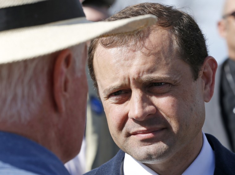 Image: Democratic candidate for governor of Virginia, former congressman Tom Perriello, speaks with a supporter after a news conference in Richmond, Virginia, Feb. 8, 2017.