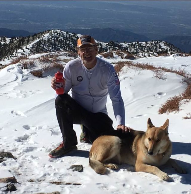 Warren Muldoon on a hike with Dakota the dog