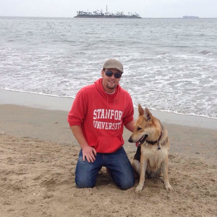 James Muldoon with Dakota the dog