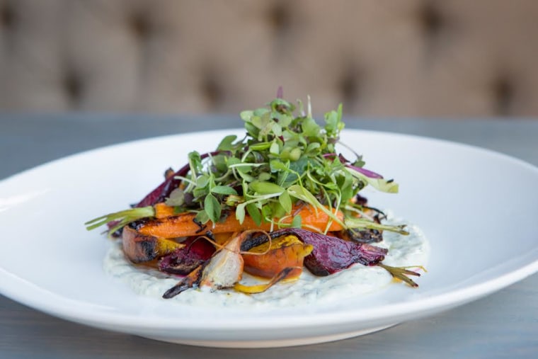 Terra Cotta's beet and carrot salad features carrot tops as an edible garnish.