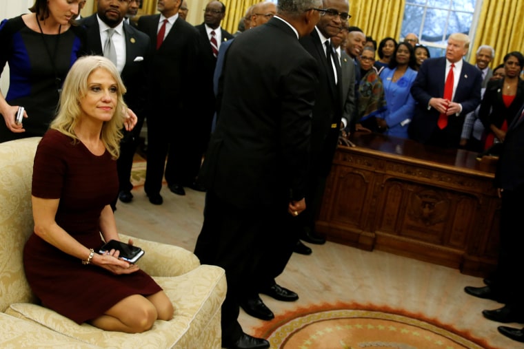 Image: Senior advisor Kellyanne Conway sits on a couch as U.S. President Donald Trump welcomes the leaders of dozens of historically black colleges and universities (HBCU) in the Oval Office at the White House in Washington