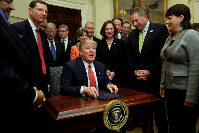 Image: U.S. President Donald Trump talks to the media after signing the water executive order at the White House, in Washington