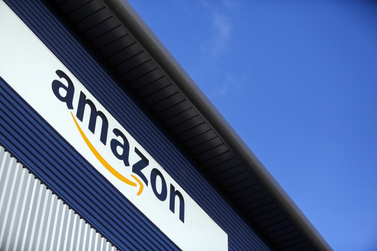Image: A sign hangs above at the Amazon.com Inc. fulfillment center