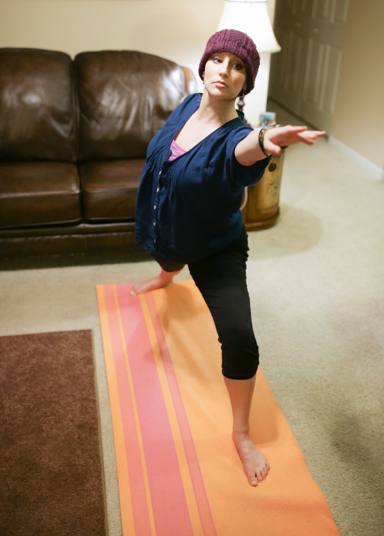 Image: Amy Schnitzler of Rochester, NY, exercises to battle the fatigue caused by breast cancer treatment