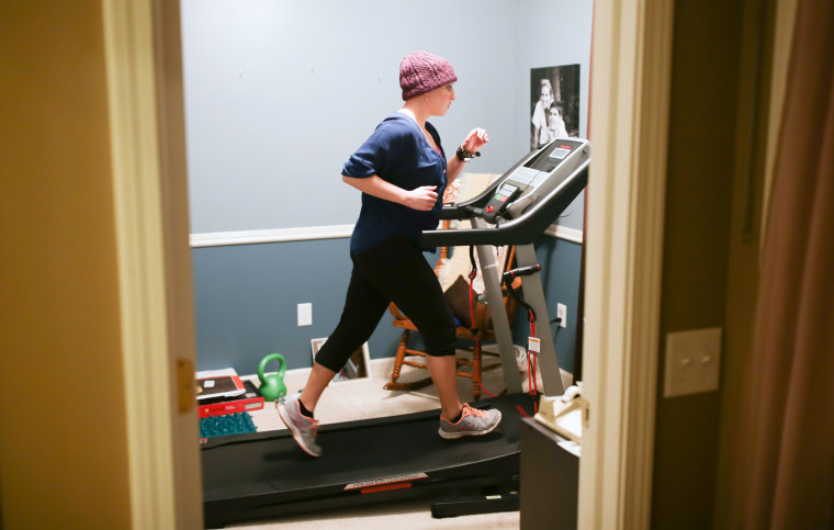 Image: Amy Schnitzler of Rochester, NY, exercises to battle the fatigue caused by breast cancer treatment