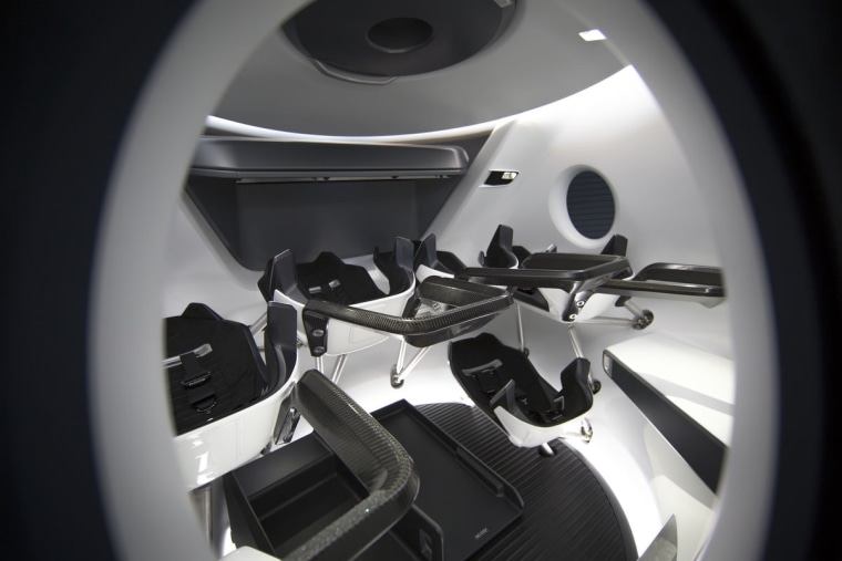 The capsule's seats are made of fabric and carbon fiber.
