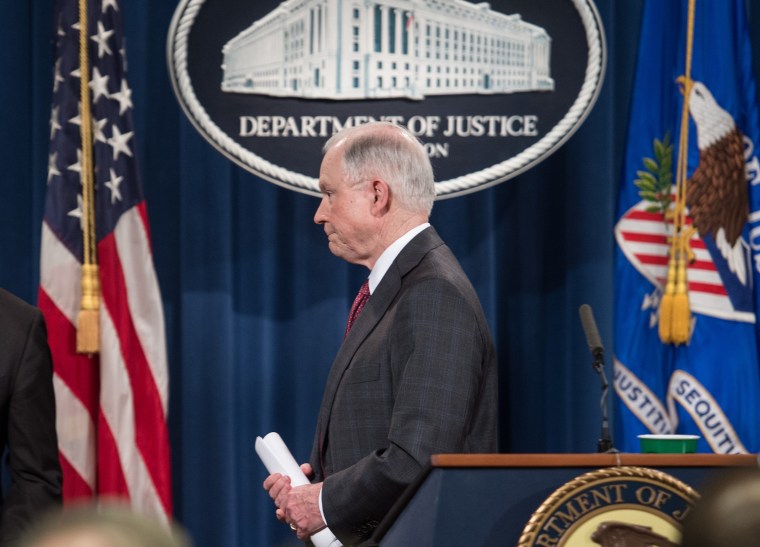 Image: Jeff Sessions walks away from the podium 
